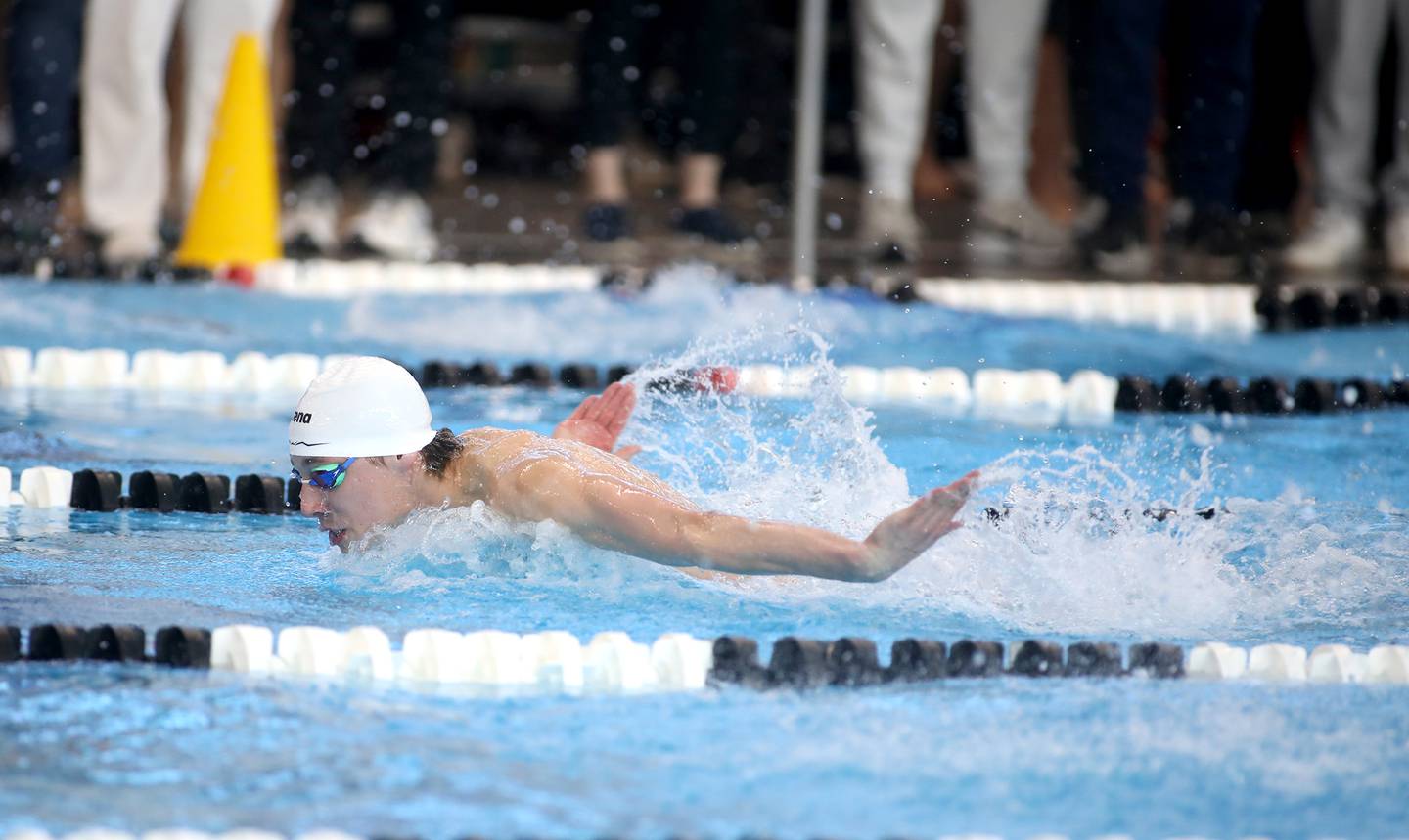 Cary-Grove’s Kasparas Venslauskas swims in the 200-meter individual medley consolation heat during the IHSA Boys State Championships on Saturday, March 1, 2025 at the FMC Natatorium in Westmont.