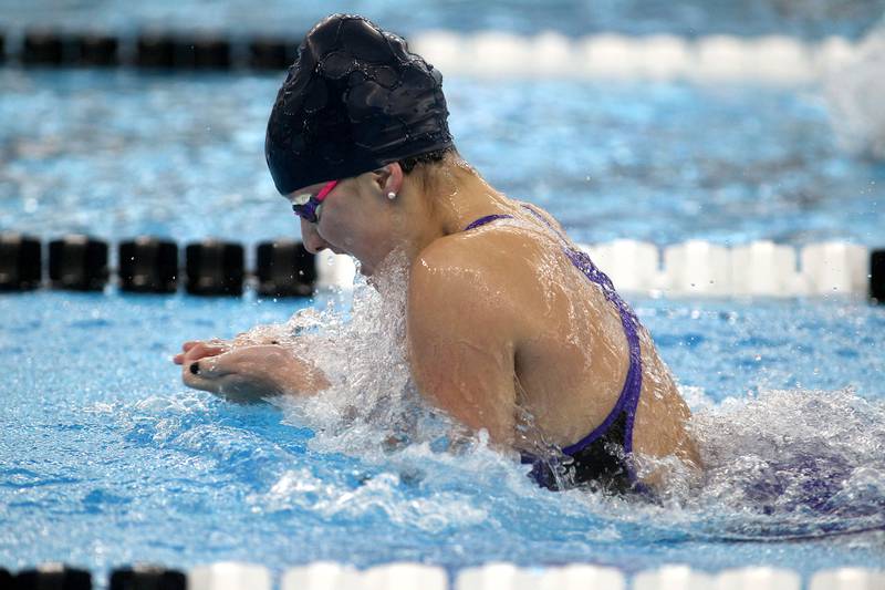 Richmond-Burton's Eleni Gewalt swims in the consolation heat of the 100-yard breaststroke during the IHSA Girls State Swimming and Diving Championships at FMC Natatorium in Westmont on Saturday, Nov. 13, 2021.