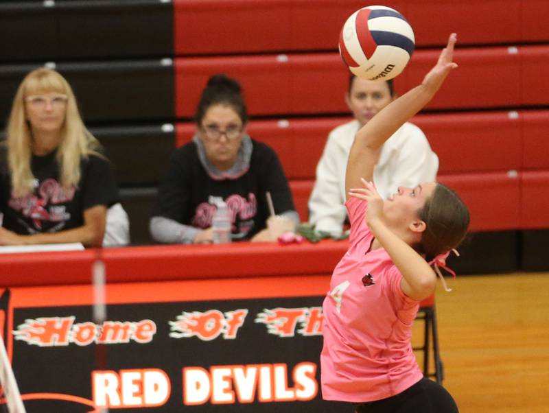 Hall's Katharine Doll spikes the ball to Princeton on Thursday, Oct. 9, 2025 at Hall High School.