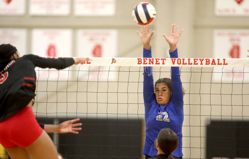 St. Charles North’s Sidney Wright goes up for a block during a game on Monday, Oct. 7, 2024 at Benet in Lisle.