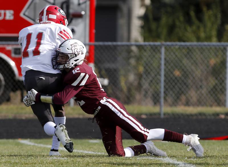 Prairie Ridge's Travis Dittmer tackles Chicago Goode's Jayden Patterson-Veal inside the five yard line as Patterson-Veal tries to return a kick off during an IHSA Class 5A first-round football game on Saturday, Nov. 2, 2024, at Prairie Ridge High School in Crystal Lake.