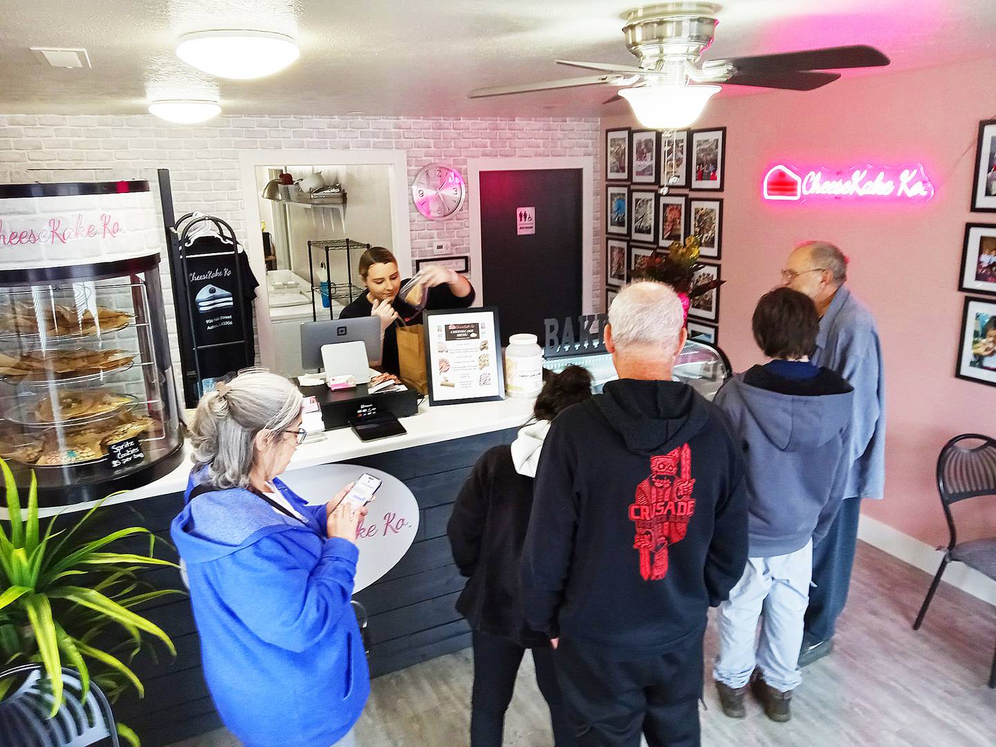 Since opening on Nov. 2, CheeseKake Ko.'s downtown Ashton store has buzzed with activity, with many customers taking time to peer through its glass case to see what satisfies their palates.