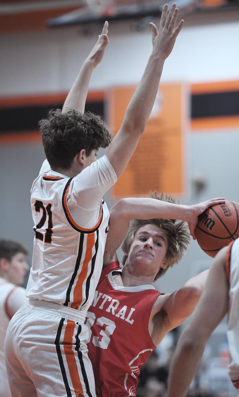 St. Charles East’s Jacob Vrankovich stops Naperville Central’s Ross DeZur in a boys basketball game in St. Charles on Wednesday, January 25, 2023.