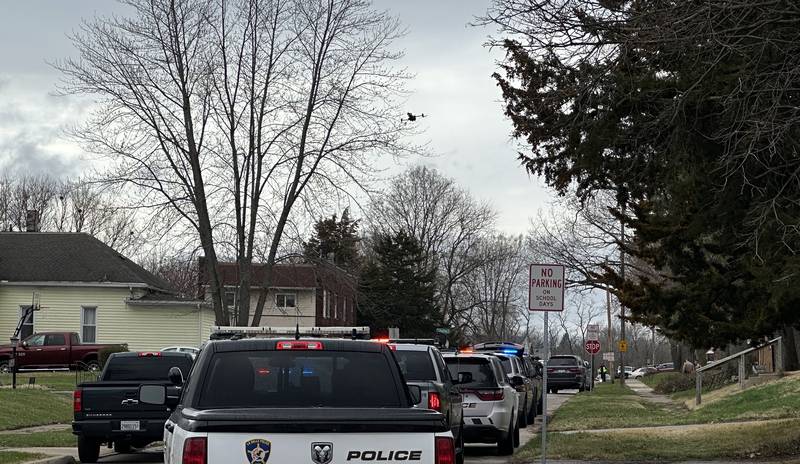 A large police presence responds Sunday, March 30, 2025, on Chartres Street between Sixth and Seventh streets in La Salle.
