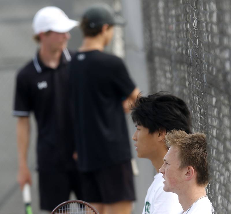 York’s Nate Yu and Brennen Maxeiner rest ask their opponents talk to their coach as they compete in the Class 2A Boys State Tennis Tournament on Thursday, May 29, 2025, at Palatine High School.