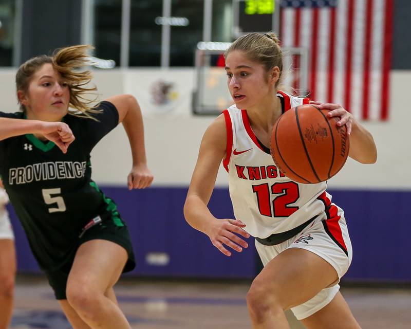 Lincoln Way Central's Brooke Katzmann (12) drives baseline in the WJOL Tournament Championship game. Nov 18, 2023.