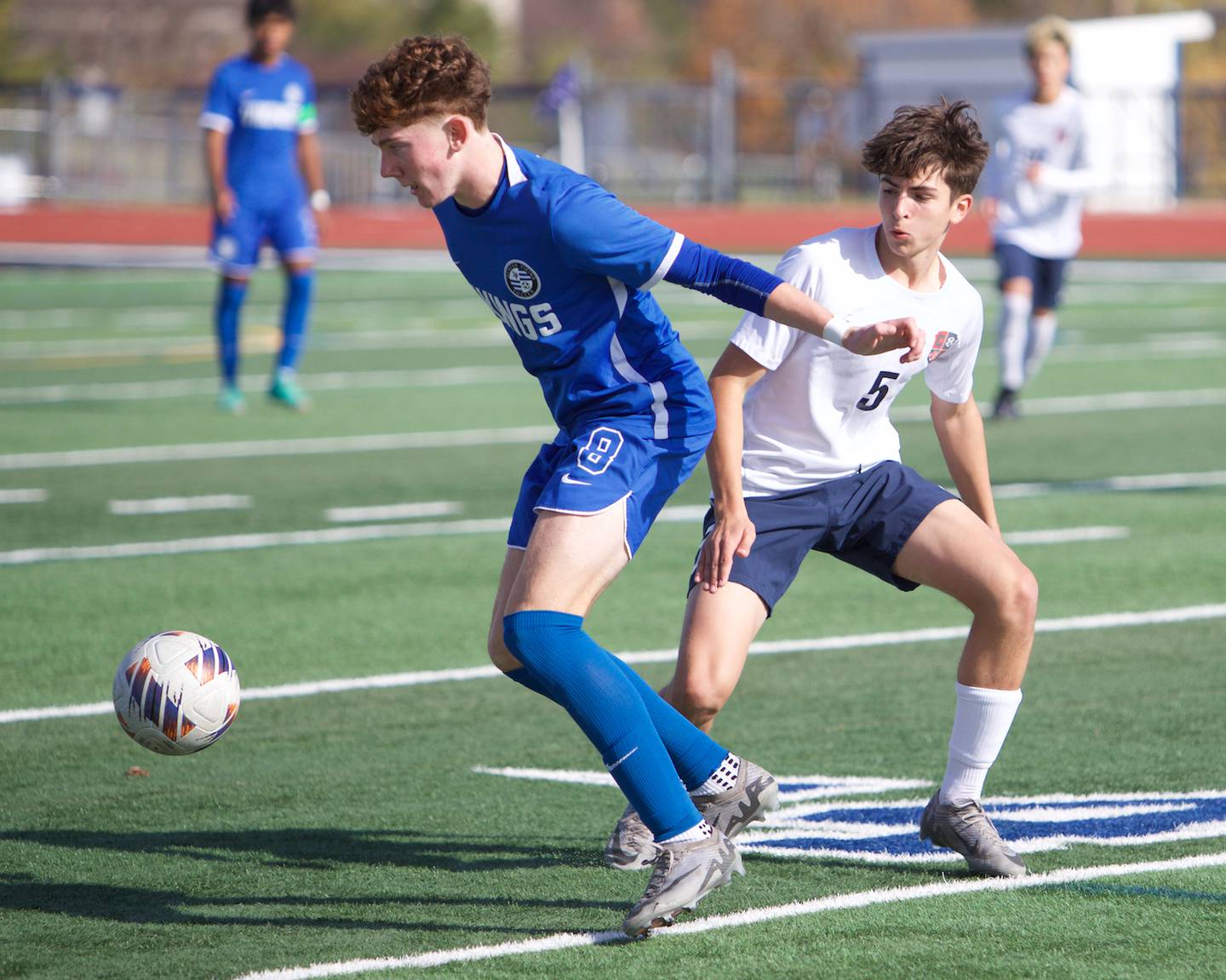 Geneva's Reece Leonard controls the ball against Conant's Jimmy Cirbo at the Class 3A St. Charles North Sectional Final on Saturday, Nov.2,2024 in St. Charles.