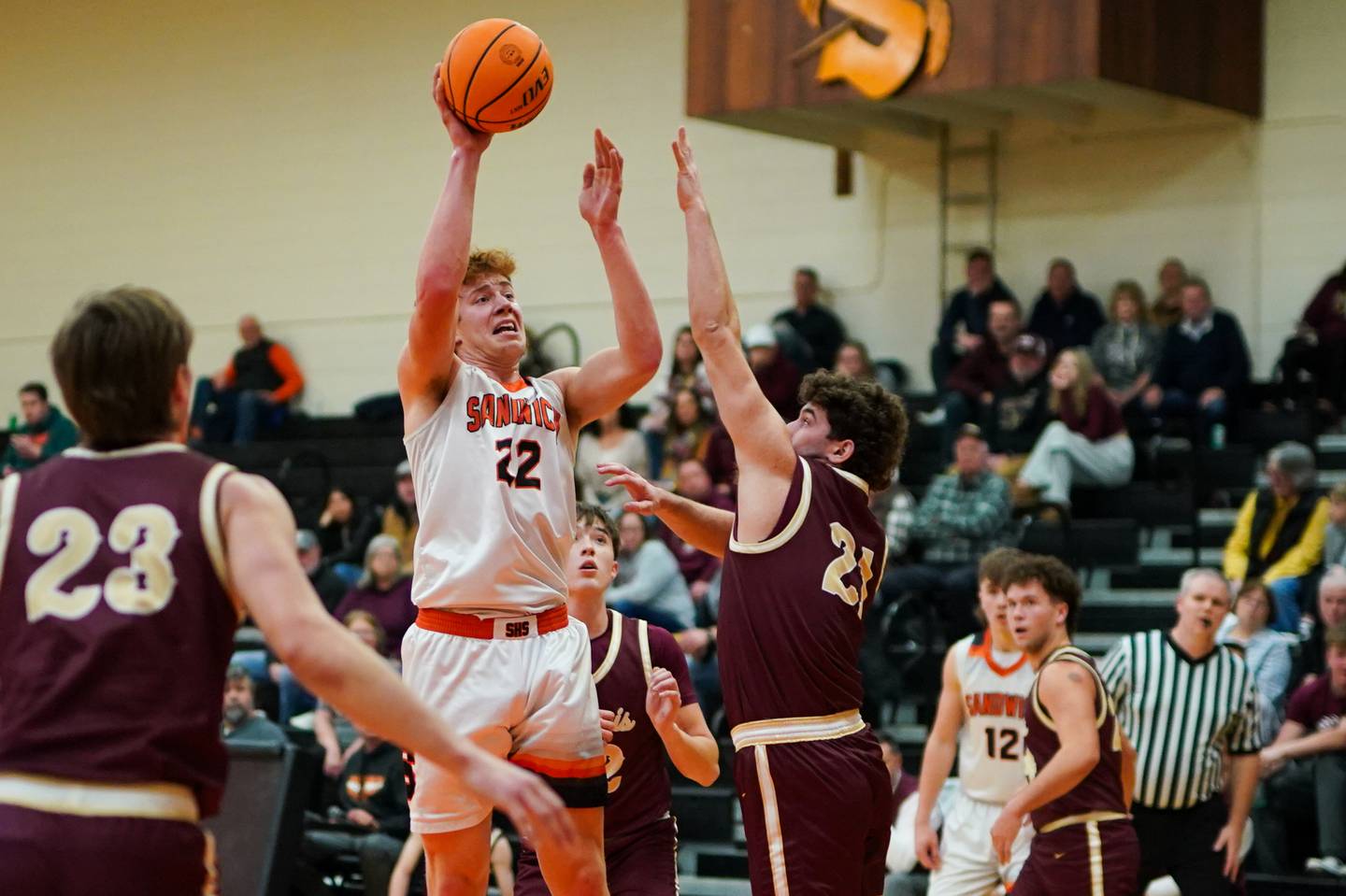 Sandwich’s Dom Rome (22) shoots the ball in the post over Morris’ Ximi Baftiri (21) during a basketball game at Sandwich High School earlier this season.