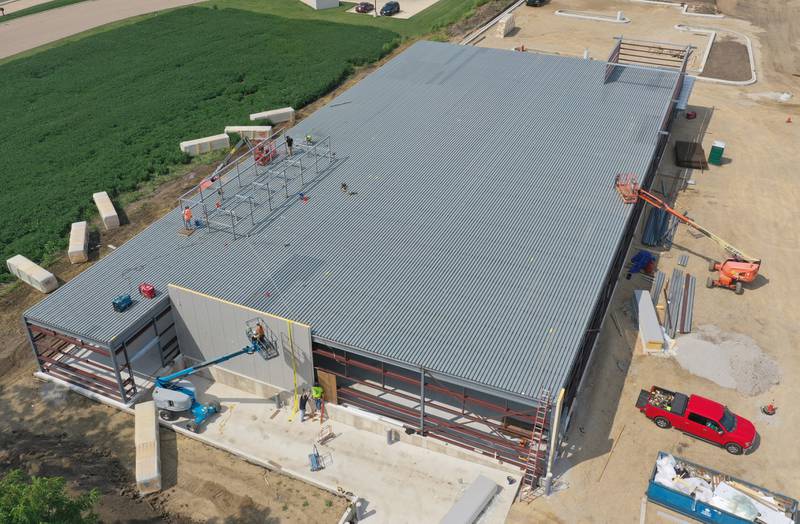 Crews continue to construct an Aldi grocery store on Tuesday, Aug. 13, 2025 at the intersection of Backbone Road and North Main Street in Princeton. Workers are beginning to build the exterior walls this week. The 20,000 square-foot store could be open by Thanksgiving.