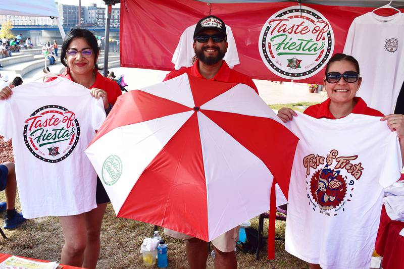 Christina Rodirguez (left), Ramses Arreola and Julie Arreola, all of Sterling, represent the Taste of Fiesta booth at Rock Falls RB&W district on Saturday, Sept. 13, 2025.