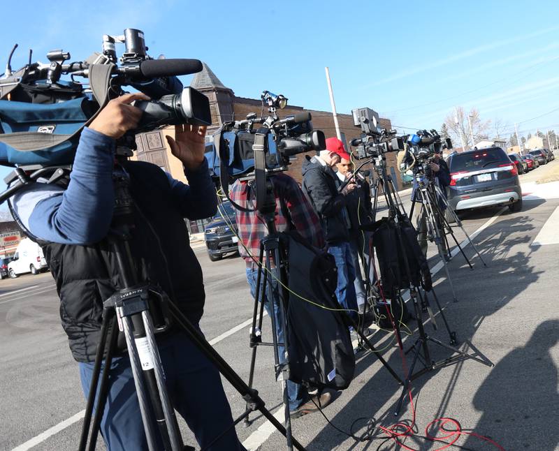 Chicago media take their positions for a press conference at the corner of 8th and Crosat Streets regarding the Carus Chemical fire on Wednesday, Jan. 11, 2023 in La Salle.