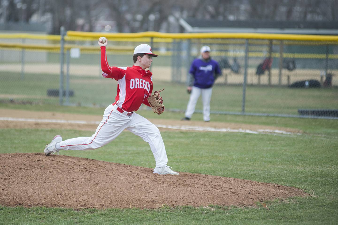 Oregon’s Jack Washburn throws a pitch against Dixon Tuesday, April 5, 2022.