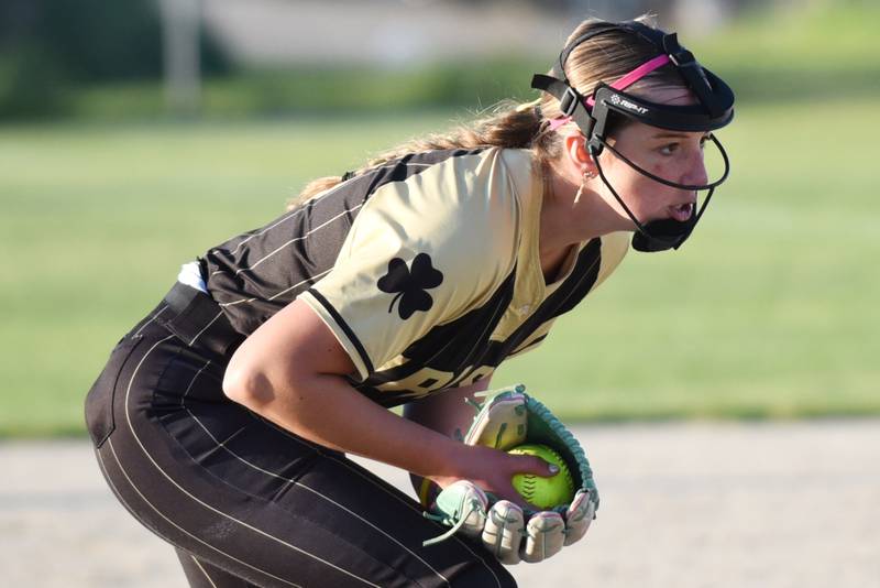Bishop McNamara's Joslynn Dole begins her windup before throwing a pitch during a home game against Bradley-Bourbonnais Thursday, May 7, 2026.