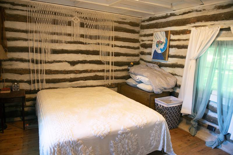 A private bedroom is one of three sleeping areas in the cabin.