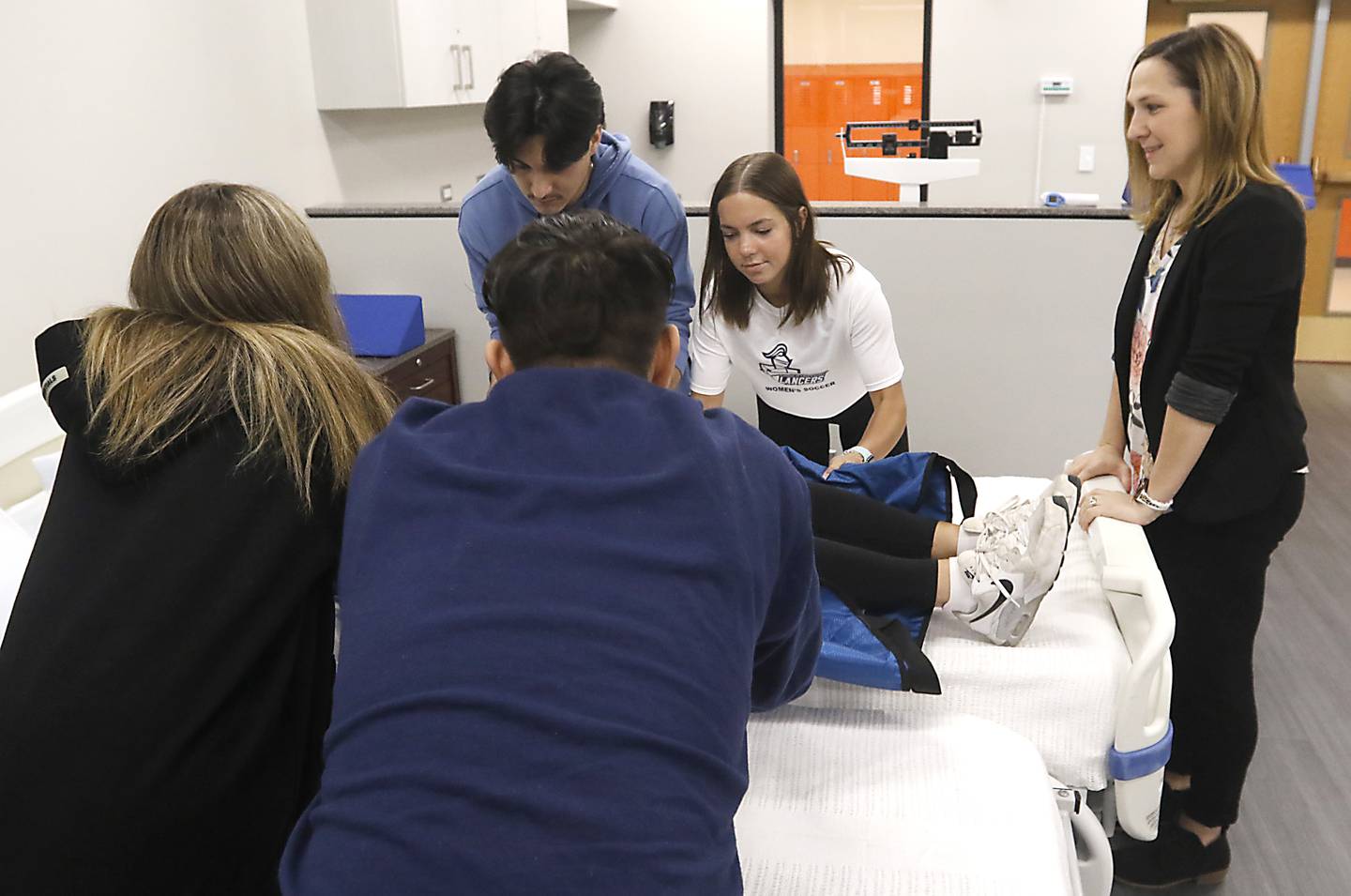 Nurse Andrea Miculinich teaches a certified nursing assistant class on Friday, April 28, 2023, at Crystal Lake Central High School.