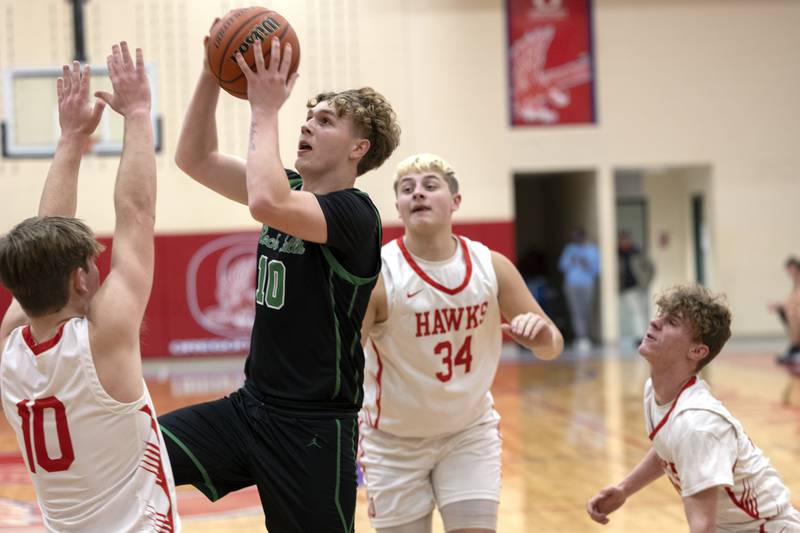 Rock Falls’ Kuitim Heald goes to the hoop Tuesday, Dec. 12, 2023 in Oregon.