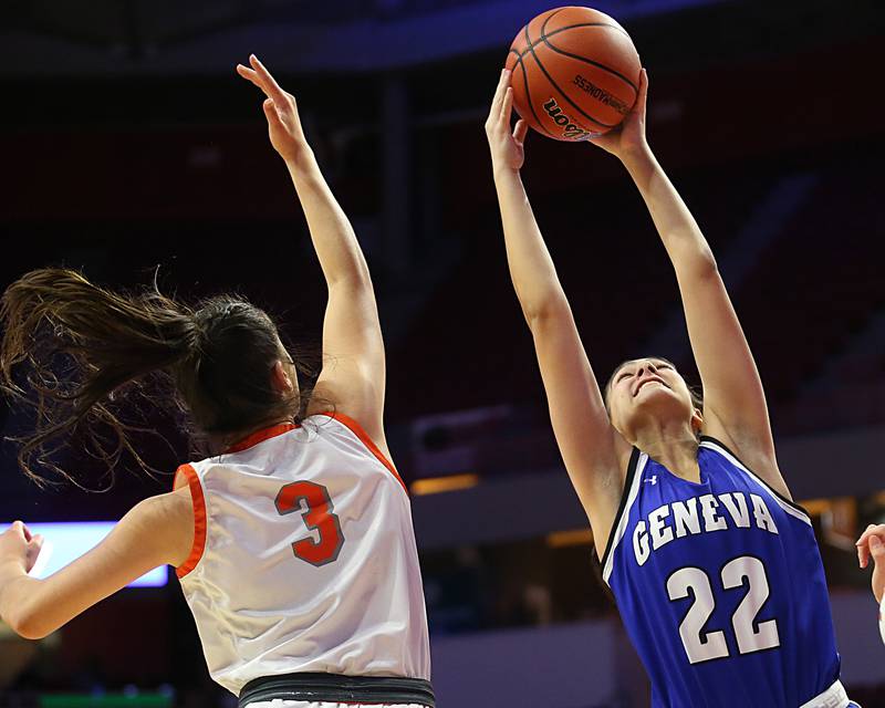 Geneva's Leah Palmer grabs a rebound over Hersey's Meghan Mrowicki during the Class 4A third place game on Friday, March 3, 2023 at CEFCU Arena in Normal.