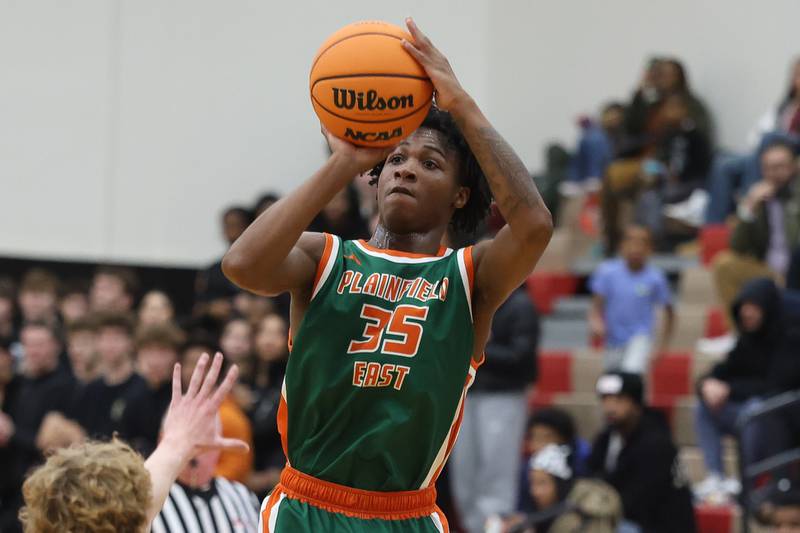 Plainfield East’s Alijah Little puts up a shot against Plainfield North on Tuesday, Dec. 9, 2025 in Plainfield.