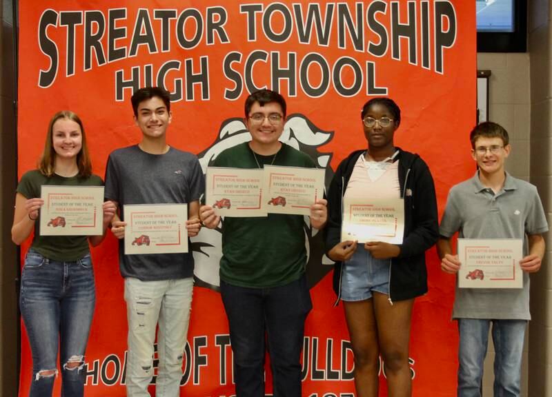 The Streator High School Board of Education recently honored students of the year at its June meeting. Students of the Year who were honored included (left to right) Nora Groesbeck (Foreign Language Department); Connor Novotney (Math Department); Ryan Orozco (both Science and Social Studies departments); Ebony Pickens (Fine Arts Department); and Trevor Talty (Guided Program for Success Department). Not pictured are Cooper Wahl (Career and Technical Ed Department); Zoey Dearth (English Department); Jaelyn Blakemore (Health & Fitness/P.E./Drivers Ed Department) and Briel Quick (Student Services Department).
