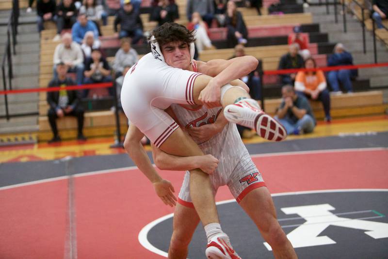 Yorkville's Dominick Recchia competes with Moline's Kayden Serrano in the 132 lb. class Final at the Class 3A Regional on Saturday, Feb.3,2024 in Yorkville.