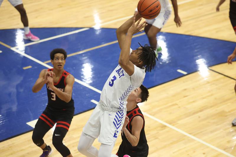 Lincoln-Way East’s Brenden Sanders take a shot against Bolingbrook on Tuesday, Dec.12th, 2023 in Frankfort.