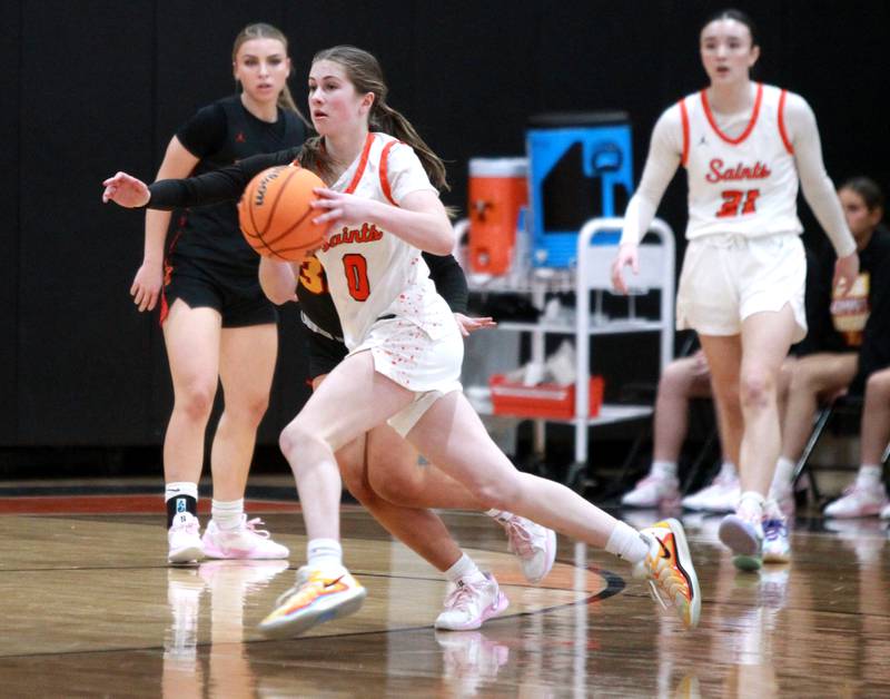St. Charles East’s Kathlyn Bainbridge passes the ball during a game against Batavia on Wednesday, Jan. 8, 2025 in St. Charles.