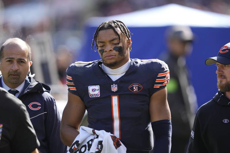 Chicago Bears quarterback Justin Fields walks to the locker room during the second half against the Minnesota Vikings, Sunday, Oct. 15, 2023, in Chicago.