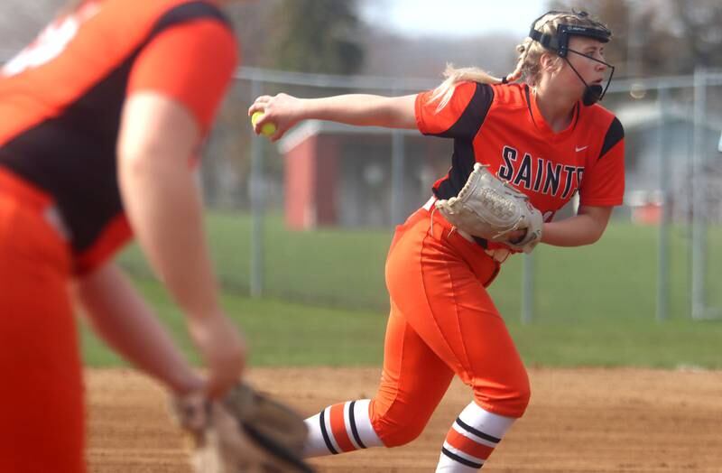 St. Charles East’s Izzy Howe makes an offering against Huntley during varsity softball at Marengo Saturday morning.