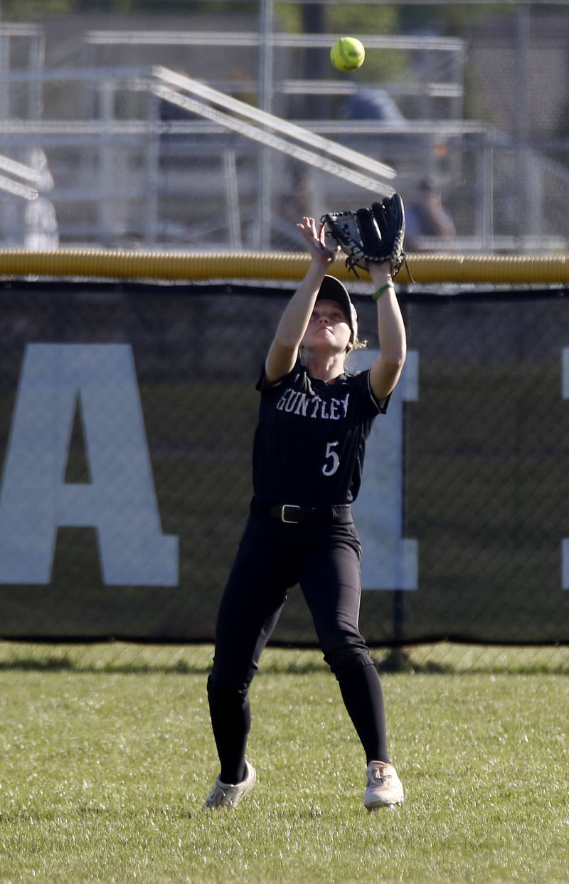 Huntley's Morgan Bzdusek catches a fly ball during a Fox Valley Conference softball game against Hampshire on Thursday, May 14, 2026, at Huntley High School.