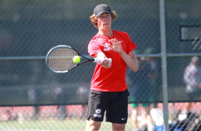 Lincoln-Way Central’s Trevor Braico returns the ball during a doubles match with partner Jon Davis (not pictured) in the state championship preliminaries at Buffalo Grove High School on Thursday, May 23, 2024.