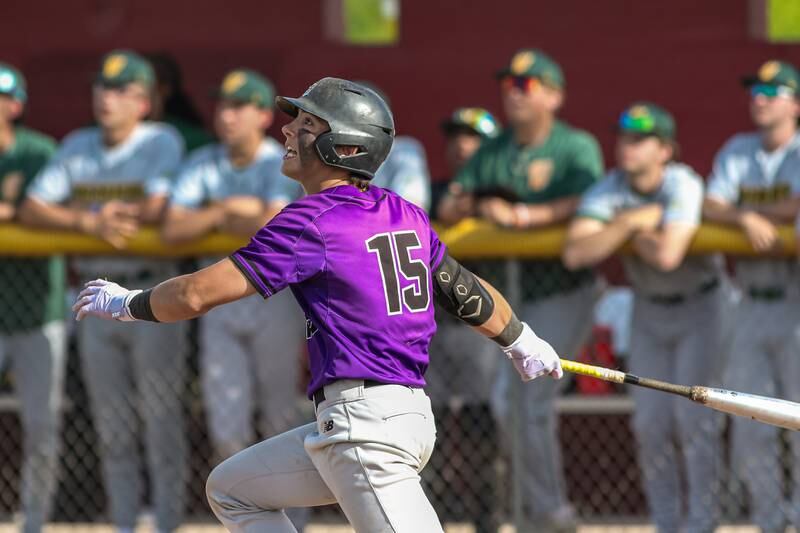 Downers Grove North's Brady Schallmoser (15) looks at his fily ball during Class 4A Sectional Final Championship game between Downers Grove North at Waubonsie Valley.  May 31, 2024