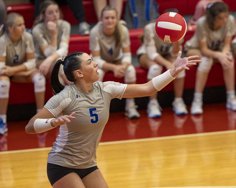 Keeley Lawson (5) of Princeton serves volleyball on Thursday, Sept. 18, 2025 at Ottawa High School in Ottawa.