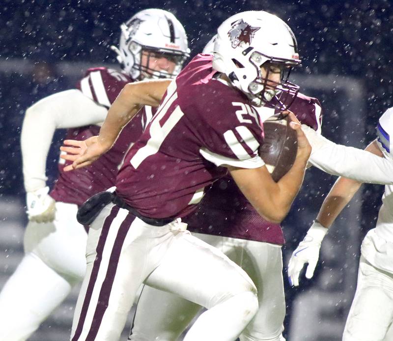 Prairie Ridge’s Vincent Byk runs the ball against Vernon Hills in IHSA football Class 5A first-round playoff action at Prairie Ridge High School in Crystal Lake on Friday, October 31, 2025.