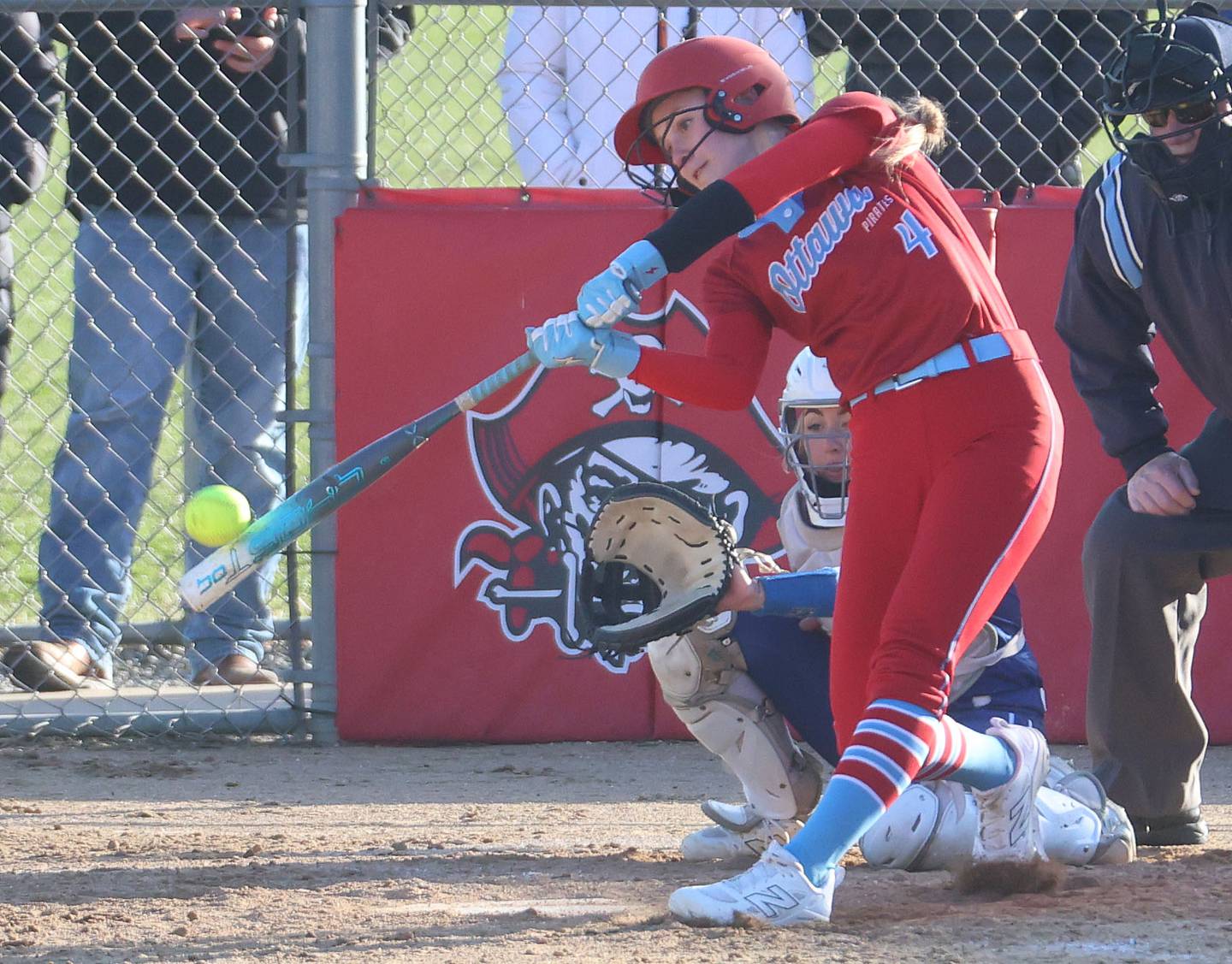 Ottawa's Teagan Darif makes contact with the ball against Princeton on Friday, March 13, 2026 at Ottawa High School.