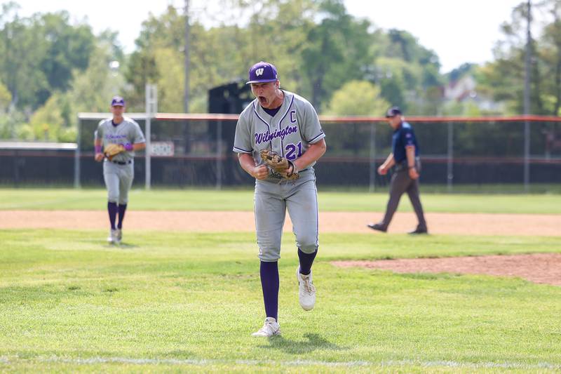 Wilmington's Lucas Rink yells in celebration after pitching the final out to help the Wildcats secured a 7-2 victory over Chicago Christian in the IHSA Class 2A Beecher Sectional semifinal on Thursday, May 29, 2025.