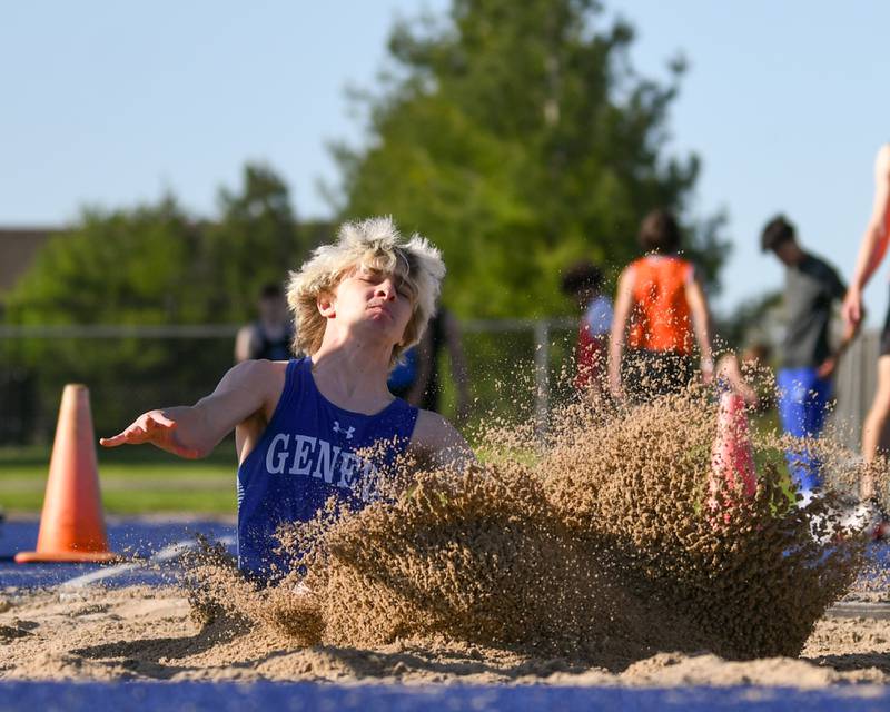 Will Pascoi of Geneva competes in the long jump during the Kane County track and field meet held at Marmion Academy in Aurora on Friday May 3, 2024.