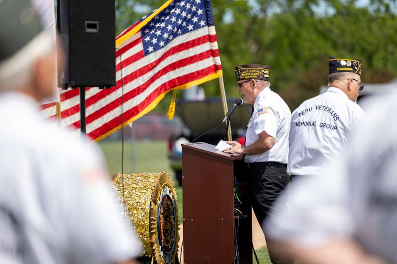 John Kirk of the Peru Honor Guard speaks at the annual Memorial Day Service on Monday, May 26, 2025 at Washington Park in Peru.