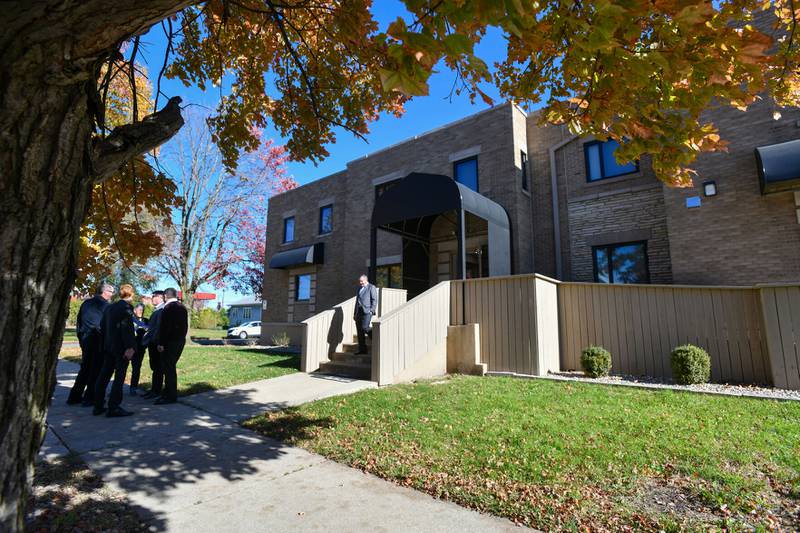 Kankakee officials finish a tour of Liberty Lodge during an open house on Monday.