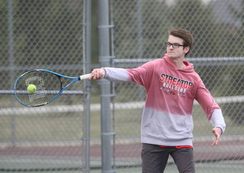 Streator's Issac Gallick plays tennis at the L-P Athletic Complex on Monday, April 3, 2023 in La Salle.