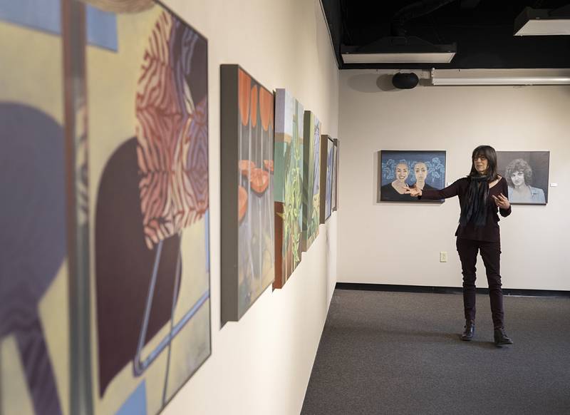 Artist Deborah Di Vita Glascott speaks about her works Monday, March 18, 2023 during the closing of her show at Sauk Valley College. Glascott has worked with SVCC art department head Glenn Bodish and with the Water Street Studio Collective of Batavia on the exhibit.