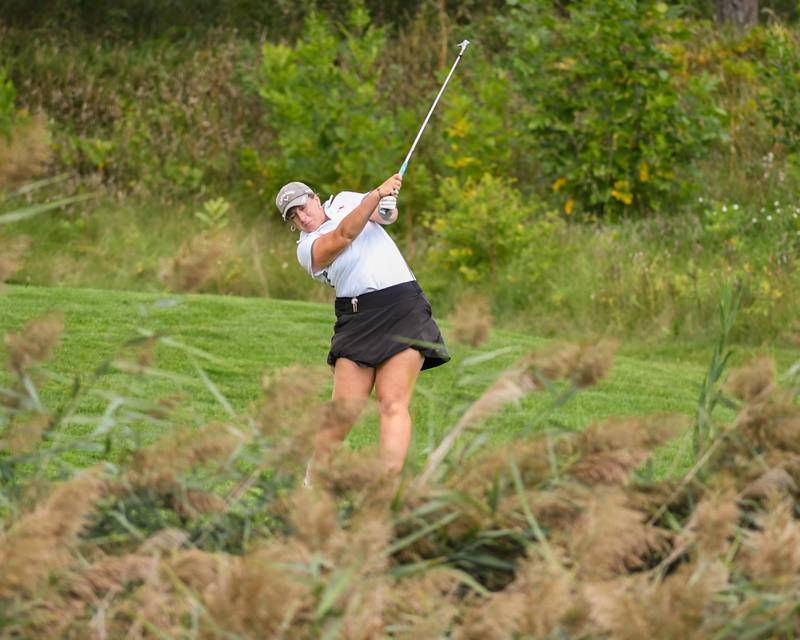Plainfield North Grace Gilbert tee’s off during the back half of the regional match Thursday Sep. 28, 2023, held at Whitetail Ridge in Yorkville.