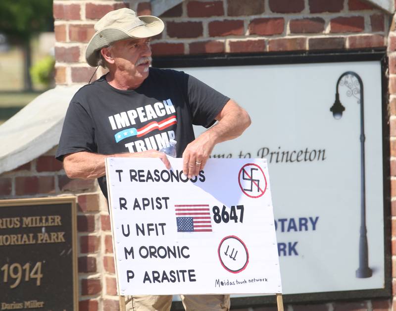 Steve Gascuigne of Princeton, holds a anti Trump sign during a No Kings Independence Day protest was held on Saturday, July 5, 2025 at Rotary Park in Princeton.