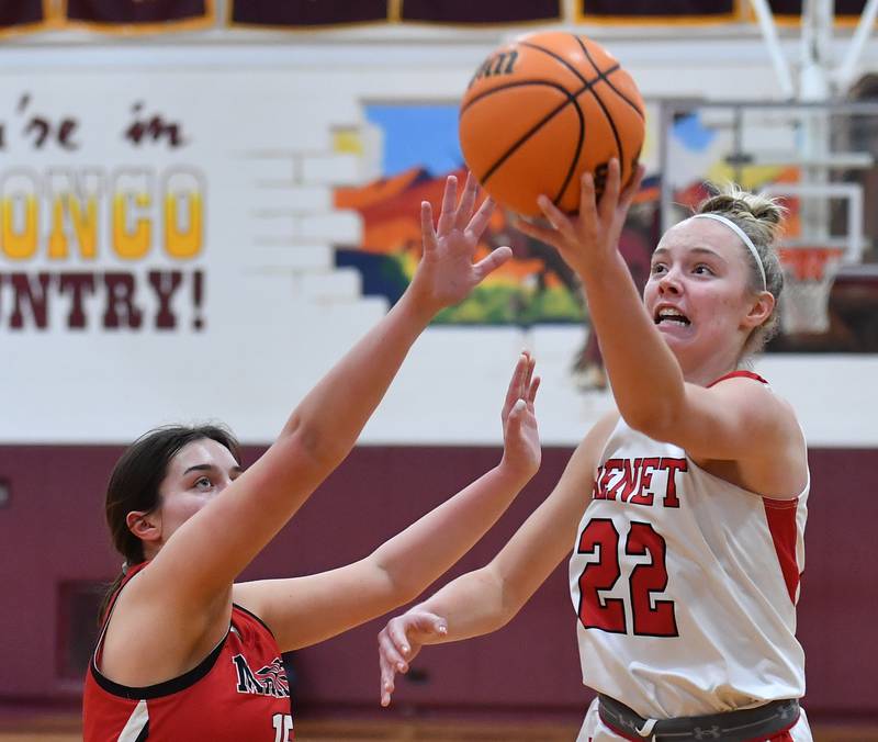 Benet’s Bridget Rifenburg (22) shoots over Marist’s Lucy Cosme during the Montini Christmas Tournament championship game on December 27, 2025 at Montini Catholic High School in Lombard.