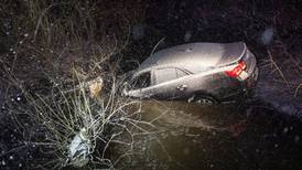 Car slides into creek near Harvard as blizzard warning takes effect late Sunday