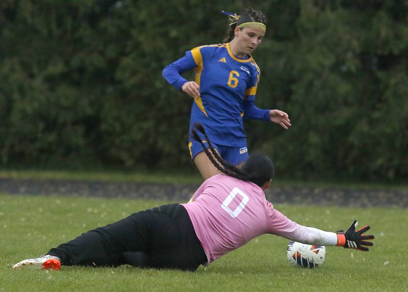 Johnsburg's Liz Smith tries to get past Harvest Christian Academy's Tia Bales during the Class 1A Marian Central Girls Soccer Regional Championship match on Tuesday, May 20, 2025, at Marian Central High School in Woodstock.