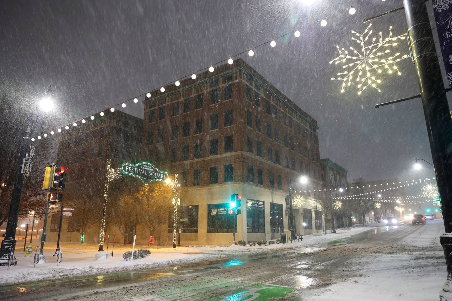 Heavy flurries fall along South Schuyler Avenue on Saturday evening, Nov. 29, 2025, as snow blanketed the area over the weekend.