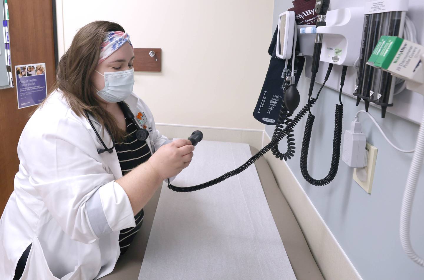 Pediatrician Dr. Blair Wright sets up an examination room for a patient visit Friday, Nov. 4, 2022, at Northwestern Medicine Valley West Hospital in Sandwich.