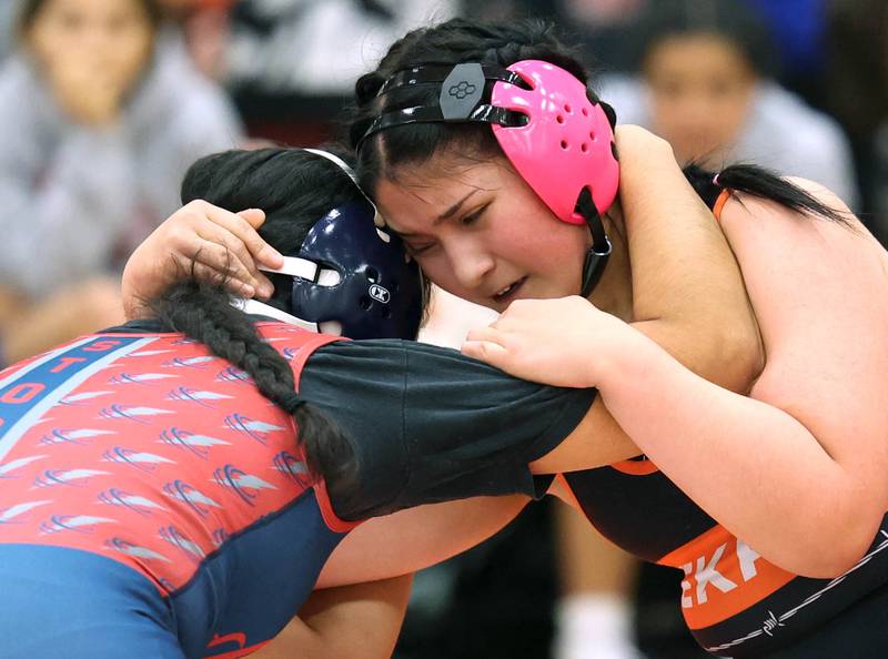 DeKalb’s Melody Vargas wrestles South Elgin’s Jackie Diaz Wednesday, Nov. 27, 2024, during their 140 pound match at DeKalb High School. Vargas went on to lose to Diaz by a fall.