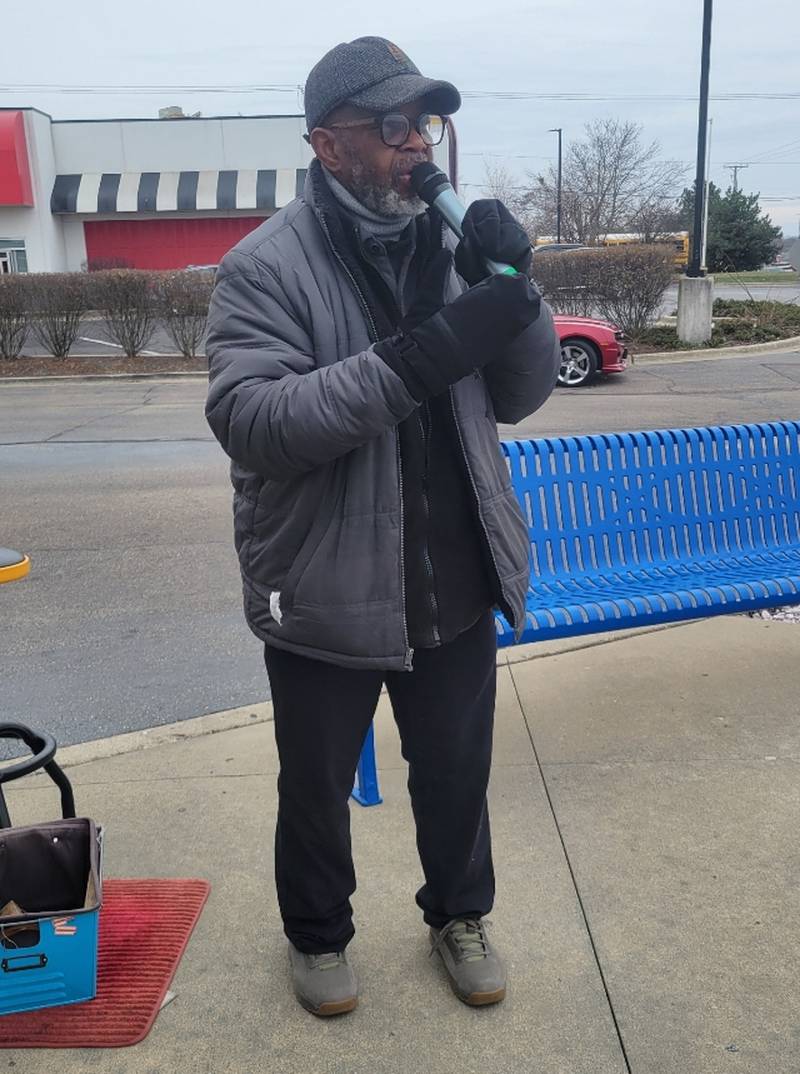 Lawrence Easley singing in December 2024 outside Fast Eddie's Car Wash in McHenry. He will have his first gig at The Vixen in McHenry on Valentine's Day, 2025.