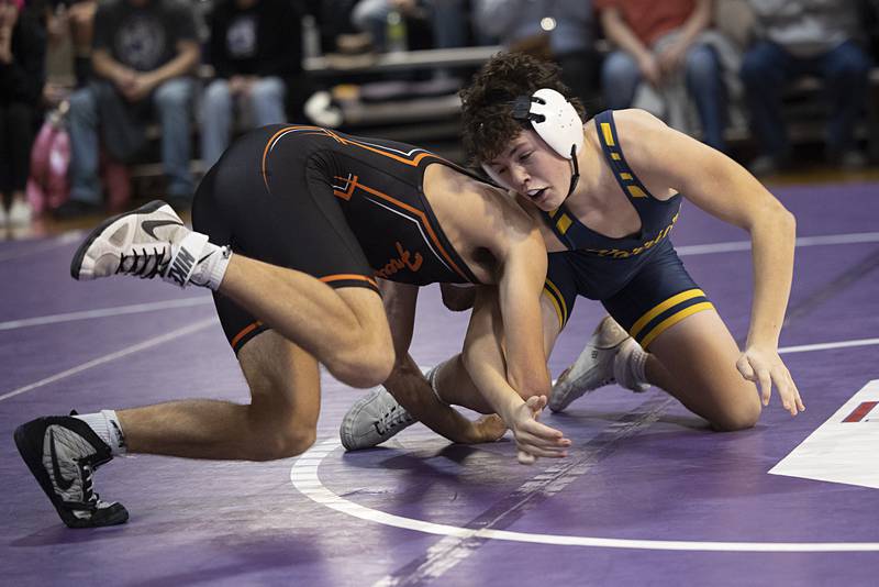 Sterling’s Eli Halverson works on Freeport’s Blake Slusser Tuesday, Jan. 13, 2025, in a triangular meet at Dixon High School.